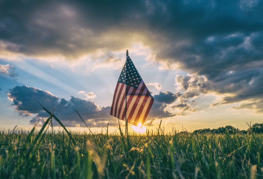 The American Flag in a valley with the sunset, The Spirit of Independence Day