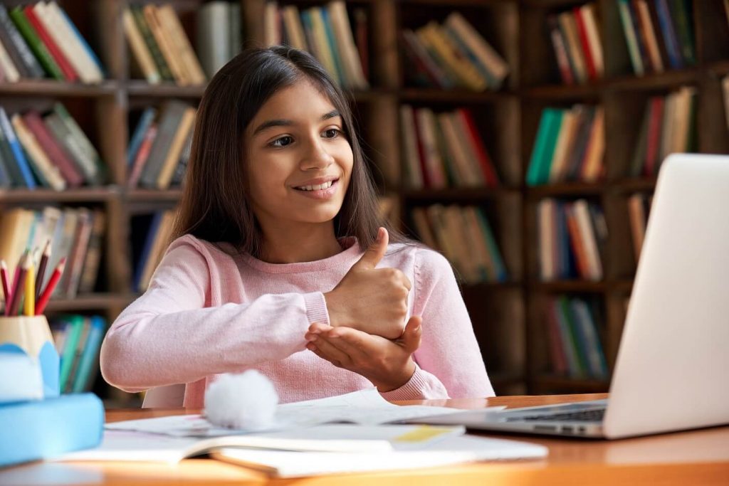 Child comunicates with sign language