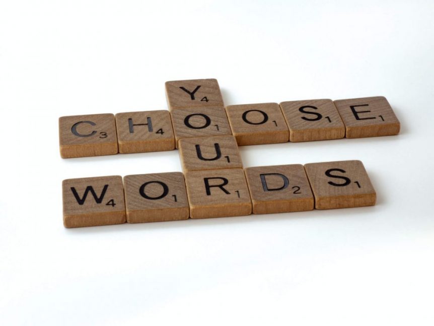 chose your words text on wooden elements