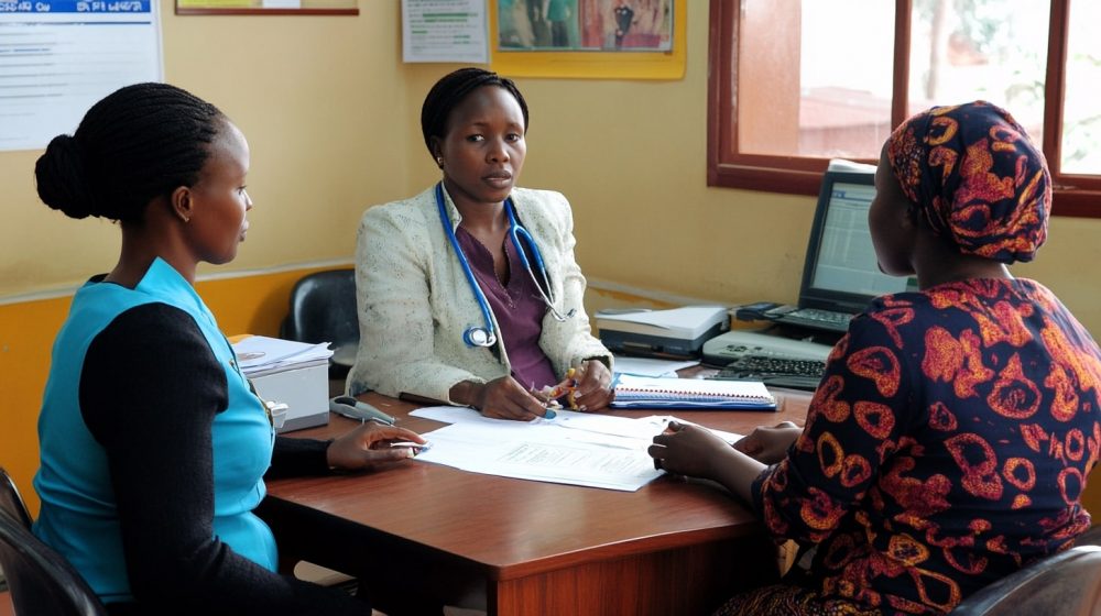 An interpreter helping a patient during a medical consultation