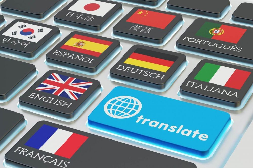 A computer keyboard with national flags on keys and a blue translate button