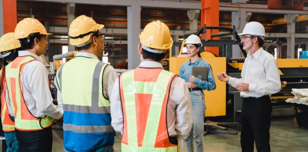 An interpreter during a technical training session in a factory